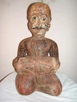 Antique Rajistani Seated Drum Musican Statue, Hand Carved Wood, India 1900. Fixed Price $650.00.