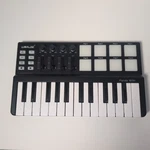 Worlde Panda Mini Usb Midi Keyboard Controller 25 Keys W/ Drum Pads Iob. Fixed Price $43.94.