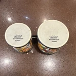 Remo Rhythm Club Bongo Connected Pair Plastic Hand Drums Graphic Print. Fixed Price $14.99.