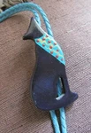 New Vintage (89) Native American Wooden Coyote Blue Leather Bolo Tie. Fixed Price $25.00.