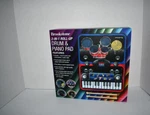 Brookstone Two-in-one Roll-up Drum & Piano Pad #SMBKN-71169 Nwt. Fixed Price $29.99.