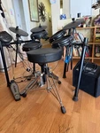 Alesis DM7X Nitro Mesh Electronic Drum Kit, Simmons DA25 Amp, Stool Bundle. Fixed Price $495.00.