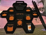 Ueteto SD-50 Roll-up Portable Digital Drum Pad, 9 Pads Silicone W/ Sticks. Fixed Price $29.85.