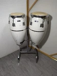 Vintage Pair Of CB-700 Percussion Conga Drum Set W/ Stand Fiberglass. Fixed Price $405.00.