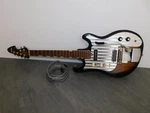 Vintage Silvertone Teisco 1436 Tabaco Burst Electric Guitar. Fixed Price $449.99.