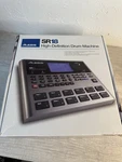 Alesis SR18 High-definition Drum Machine, Model Mpn. Fixed Price $200.00.