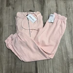 Brandy Melville Zip Up Hoodie & Sweatpants Light Pink. Fixed Price $64.00.