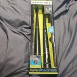 Sharper Image Digital Drum Sticks Built-in Speakers Light-up Tips. Fixed Price $6.00.