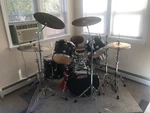 Evans Drum Set, Pearl High Hat, Tama/zildjian Cymbles, Pacific Speed Pedal, Cow. Fixed Price $850.00.