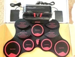 Ammoon 9 Pads Portable Midi Electronic Roll Up Drum Kit With Built In Speakers. Fixed Price $179.99.